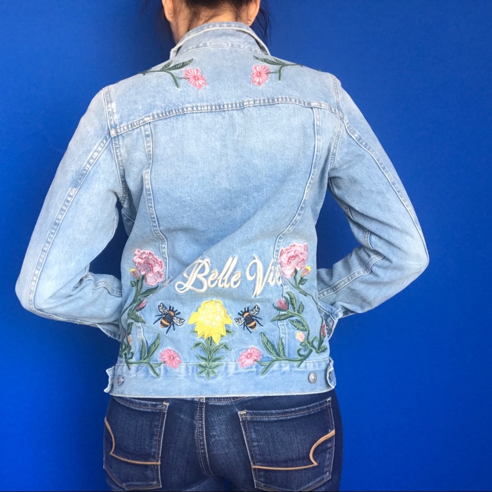 Patched and embroidered denim jacket
